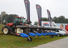 Handmatig oogsten in 9 rijen tegelijk met behulp van Deto Mechanisatie